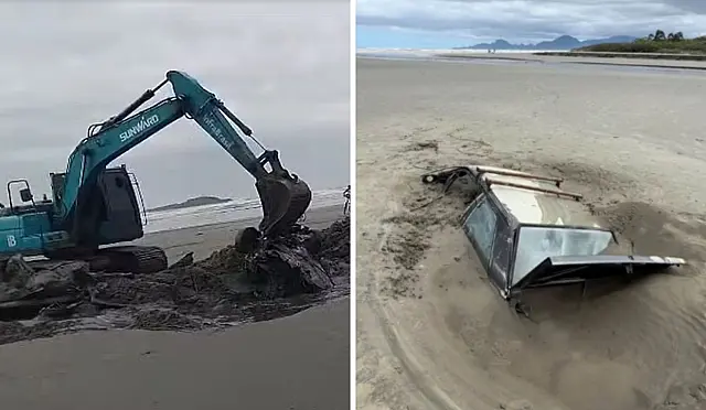 Carro soterrado na Praia da Gaivota é retirado após ficar preso na areia em Itanhaém